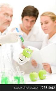 Genetic engeneering - scientists in laboratory, GMO testing experiment
