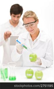 Genetic engineering - scientists in laboratory, GMO testing experiment