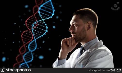 genetics, science and people concept - male doctor or scientist in white coat looking at virtual projection of dna molecule over black background. doctor or scientist looking at dna molecule