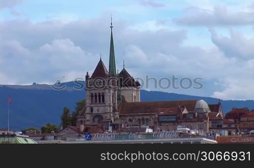 Geneva: views of the Mont Blanc bridge and the Cathedral of St. Peter