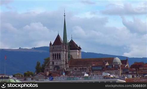 Geneva: views of the Mont Blanc bridge and the Cathedral of St. Peter