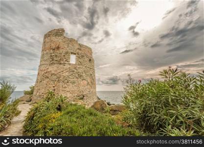 Genoese tower against a dramatic sky at Erbalunga on Cap Corse in northern Corsica