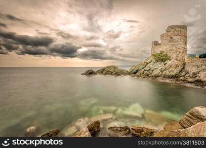 Genoese tower against a dramatic sky at Erbalunga on Cap Corse in northern Corsica