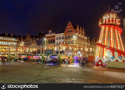 Gent. Downtown at Christmas.. The market square of the city of Ghent in Christmas decorations and illuminations.