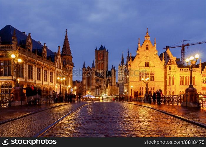 Gent. View of the old city at night.. Facades of old medieval houses on the central waterfront in Ghent at night.