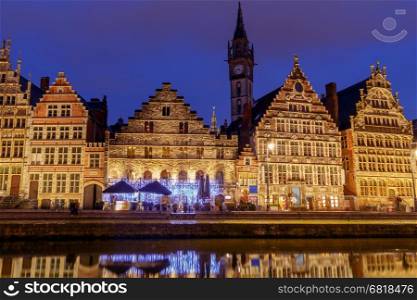 Gent. View of the old city at night.. Facades of old medieval houses on the central waterfront in Ghent at night.