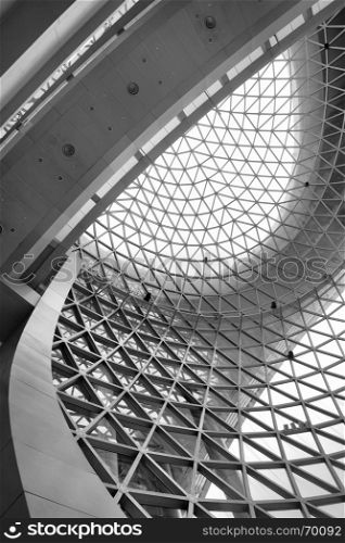 Geometric ceiling - abstract architectural background. Black and white image