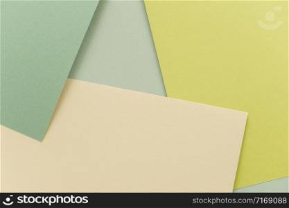 Geometric paper background, texture of green shades. Backdrop for your design. Spring time pastel colors.. Geometric paper background, texture of green shades. Backdrop for your design. Spring time pastel colors