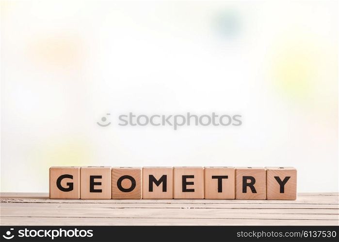 Geometry lessons sign on a classroom table