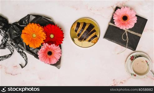 gerbera flowers packaging film with gift box croissant