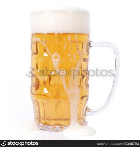 German beer glass. Large German bierkrug beer mug tankard glass of Lager - isolated over white background