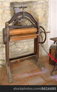 German Miele Antique wringer washer in the Saxon Fortified church of Prejmer, Brasov, Romania 04.11.2018
