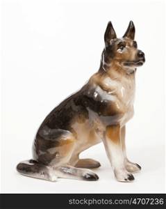 German Shepherds. Ceramic figurine, dog breed isolated on white