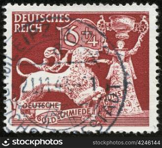 "GERMANY - CIRCA 1942: A stamp printed by the fascist Germany Post is entitled "Art of German jewellers", circa 1942"