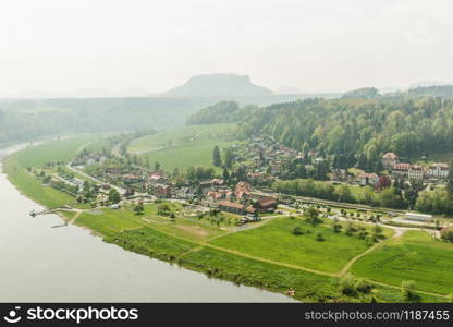 Germany, provincial town in green forest on Elbe river. Buildings in old european style, German architecture