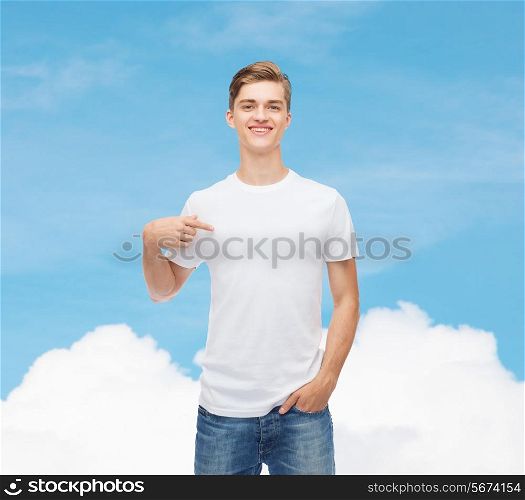gesture, advertising, dream and people concept - smiling young man in blank white t-shirt pointing finger on himself over blue sky background
