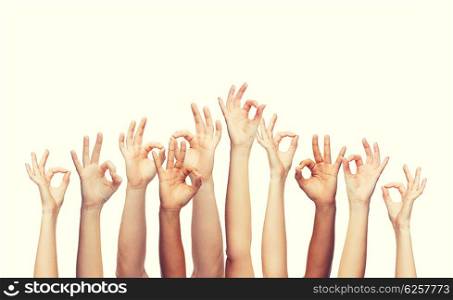 gesture and body parts concept - human hands showing ok sign. human hands showing ok sign