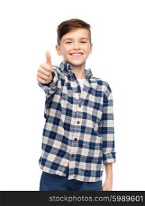 gesture, childhood, gender, fashion and people concept - smiling boy in checkered shirt and jeans showing thumbs up