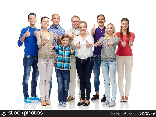 gesture, family, generation and people concept - group of smiling men, women and boy showing thumbs up