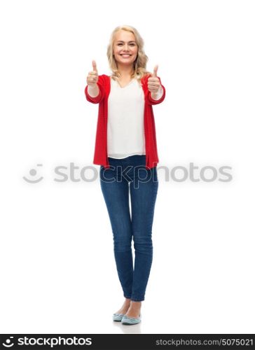 gesture, fashion, portrait and people concept - happy smiling young woman in red cardigan showing thumbs up over white. happy smiling young woman showing thumbs up