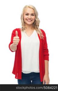gesture, fashion, portrait and people concept - happy smiling young woman in red cardigan showing thumbs up over white. happy smiling young woman showing thumbs up. happy smiling young woman showing thumbs up
