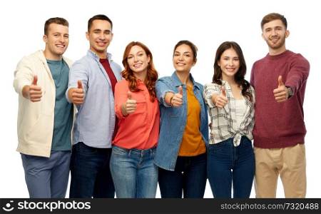 gesture, friendship and people concept - group of smiling friends showing thumbs up over white background. group of smiling friends showing thumbs up