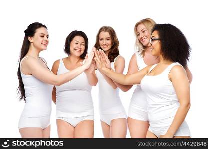 gesture, friendship, beauty, body positive and people concept - group of happy different women in white underwear making high five