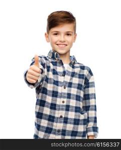 gesture, gender, childhood, fashion and people concept - smiling boy in checkered shirt and jeans showing thumbs up