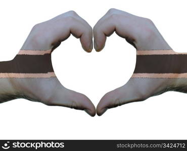 Gesture made by botswana flag colored hands showing symbol of heart and love, isolated on white background