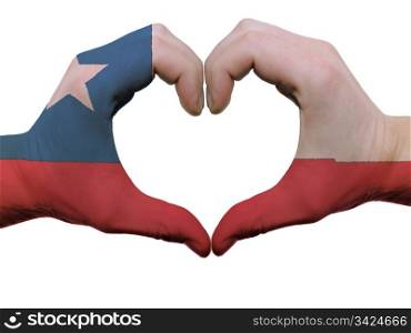 Gesture made by chile flag colored hands showing symbol of heart and love, isolated on white background