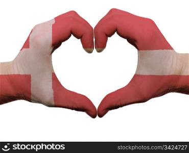Gesture made by denmark flag colored hands showing symbol of heart and love, isolated on white background