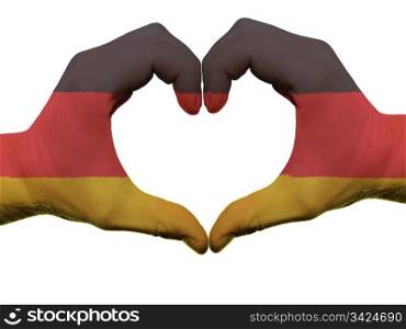 Gesture made by germany flag colored hands showing symbol of heart and love, isolated on white background