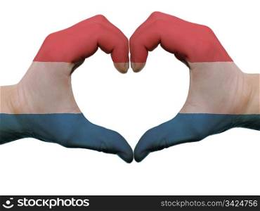 Gesture made by holland flag colored hands showing symbol of heart and love, isolated on white background