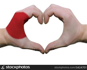 Gesture made by japan flag colored hands showing symbol of heart and love, isolated on white background