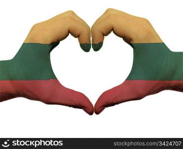 Gesture made by lithuania flag colored hands showing symbol of heart and love, isolated on white background