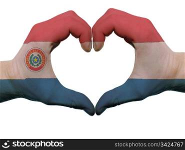 Gesture made by paraguay flag colored hands showing symbol of heart and love, isolated on white background