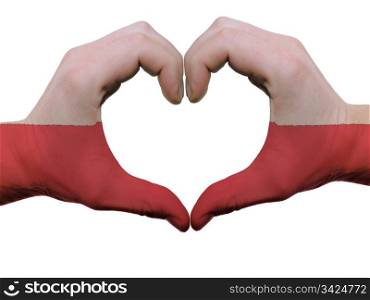Gesture made by poland flag colored hands showing symbol of heart and love, isolated on white background