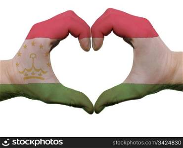 Gesture made by tajikistan flag colored hands showing symbol of heart and love, isolated on white background