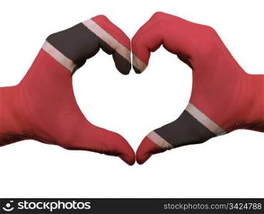 Gesture made by trinidad tobago flag colored hands showing symbol of heart and love, isolated on white background