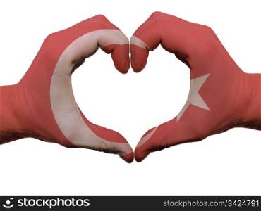 Gesture made by turkey flag colored hands showing symbol of heart and love, isolated on white background