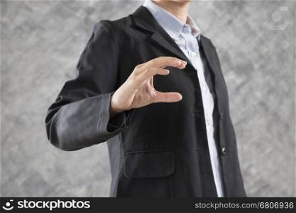 gesture of businesswoman hand holding something for use as business concept