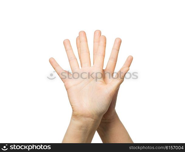 gesture, people and body parts concept - close up of two hands showing five fingers