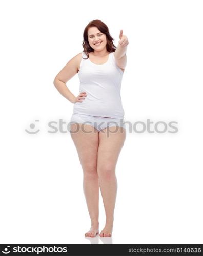 gesture, weight loss and people concept - smiling young plus size woman in underwear showing thumbs up