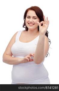 gesture, weight loss and people concept - smiling young plus size woman in underwear showing ok hand sign