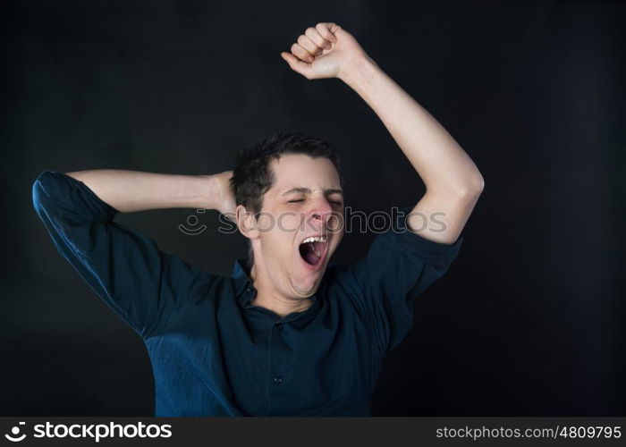 gestures of a young man yawn very sleepy