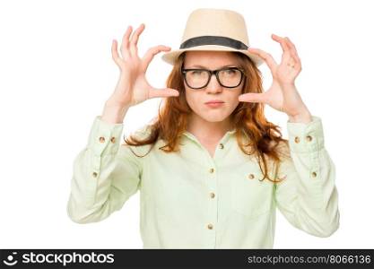 gesturing woman in a hat on a white background