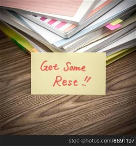 Get Some Rest; The Pile of Business Documents on the Desk