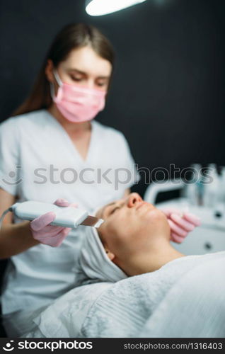 Getting rid of wrinkles in cosmetology clinic. Facial skincare in spa salon, health care. Rejuvenation procedure, beauty medicine. Getting rid of wrinkles in cosmetology clinic