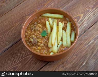 Gheimeh - Persian and Mesopotamian stew of which the main ingredients are meat, tomatoes, split peas, onion