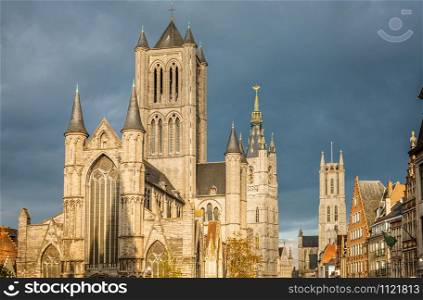 Ghent city historical center with Saint Nicholas cathedral facade, Belfry and saint Bavo&rsquo;s cathedral in the background, Flemish Region, Belgium
